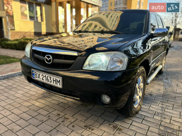 Черный Мазда Трибьют, объемом двигателя 2 л и пробегом 267 тыс. км за 4999 $, фото 5 на Automoto.ua