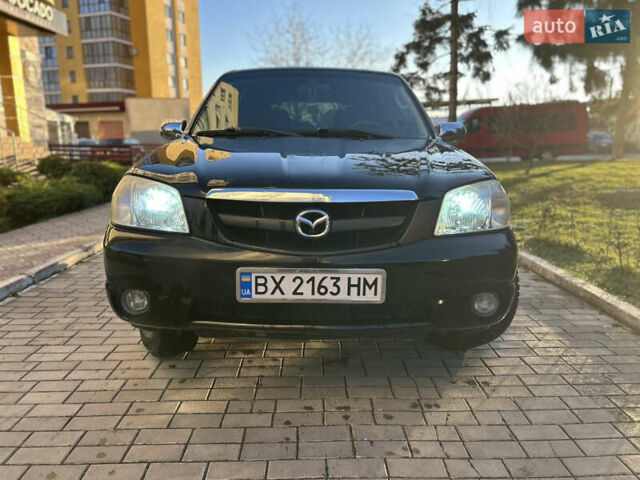 Черный Мазда Трибьют, объемом двигателя 2 л и пробегом 267 тыс. км за 4999 $, фото 2 на Automoto.ua