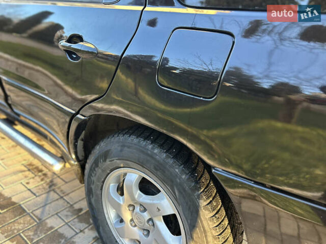 Черный Мазда Трибьют, объемом двигателя 2 л и пробегом 267 тыс. км за 4999 $, фото 18 на Automoto.ua