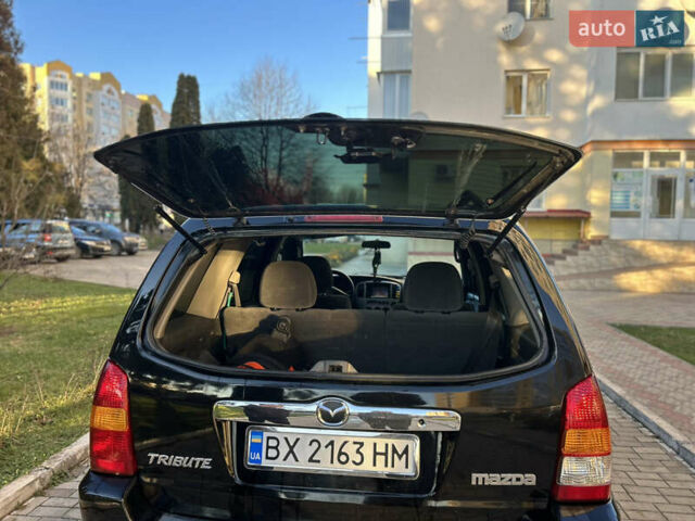 Черный Мазда Трибьют, объемом двигателя 2 л и пробегом 267 тыс. км за 4999 $, фото 35 на Automoto.ua