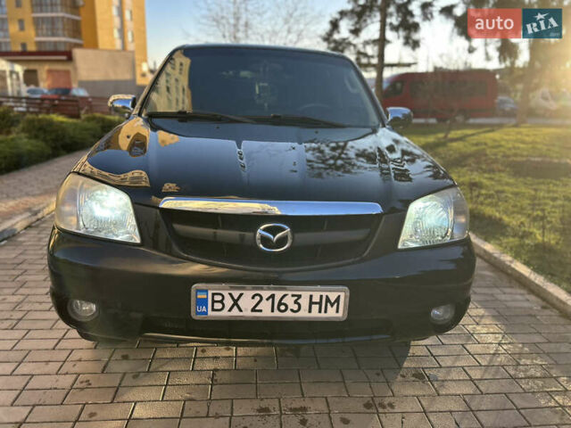 Черный Мазда Трибьют, объемом двигателя 2 л и пробегом 267 тыс. км за 4999 $, фото 9 на Automoto.ua