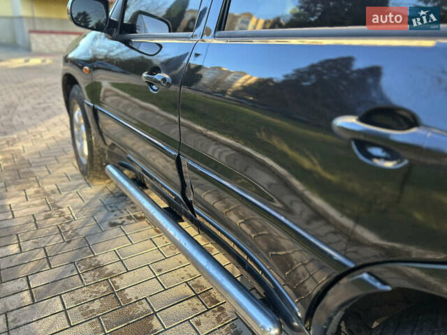 Черный Мазда Трибьют, объемом двигателя 2 л и пробегом 267 тыс. км за 4999 $, фото 19 на Automoto.ua