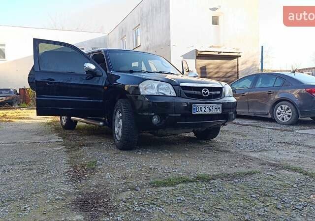 Чорний Мазда Трибьют, об'ємом двигуна 2 л та пробігом 267 тис. км за 4800 $, фото 7 на Automoto.ua