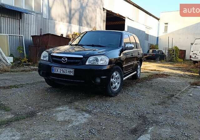 Чорний Мазда Трибьют, об'ємом двигуна 2 л та пробігом 267 тис. км за 4800 $, фото 1 на Automoto.ua