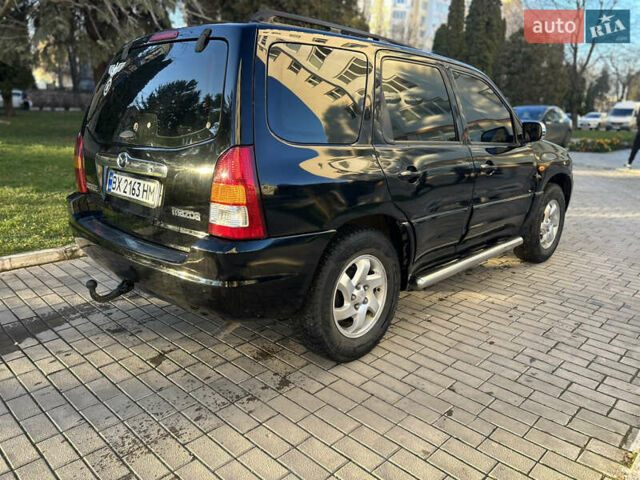 Черный Мазда Трибьют, объемом двигателя 2 л и пробегом 267 тыс. км за 4999 $, фото 14 на Automoto.ua