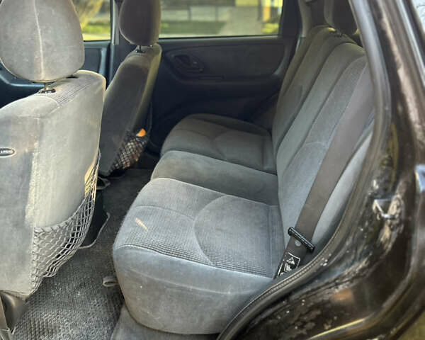 Черный Мазда Трибьют, объемом двигателя 2 л и пробегом 267 тыс. км за 4999 $, фото 33 на Automoto.ua