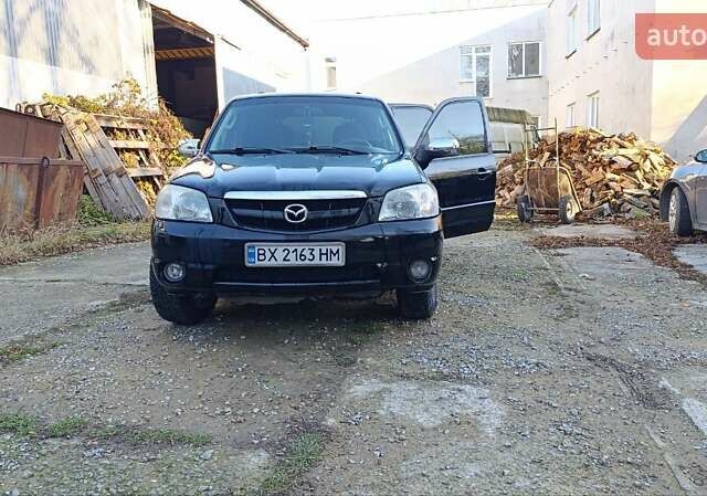 Чорний Мазда Трибьют, об'ємом двигуна 2 л та пробігом 267 тис. км за 4800 $, фото 3 на Automoto.ua
