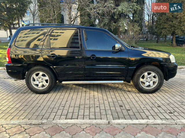 Черный Мазда Трибьют, объемом двигателя 2 л и пробегом 267 тыс. км за 4999 $, фото 10 на Automoto.ua
