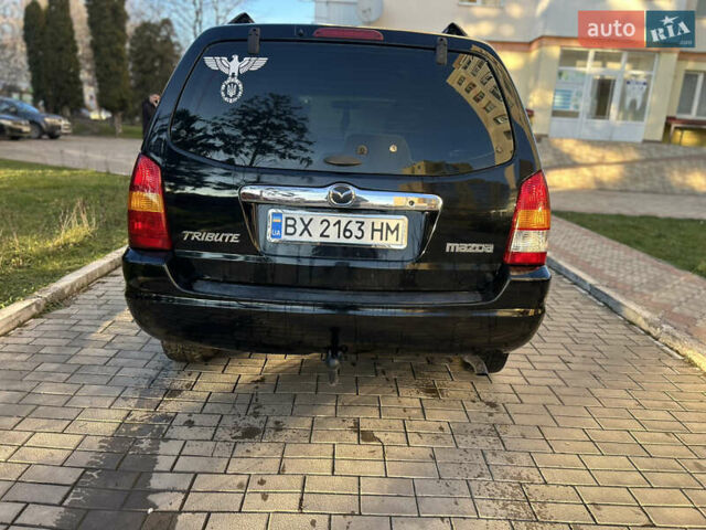 Черный Мазда Трибьют, объемом двигателя 2 л и пробегом 267 тыс. км за 4999 $, фото 16 на Automoto.ua