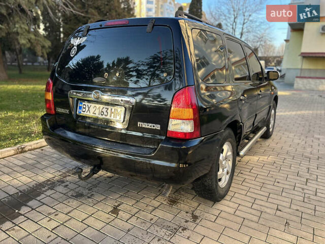 Черный Мазда Трибьют, объемом двигателя 2 л и пробегом 267 тыс. км за 4999 $, фото 15 на Automoto.ua