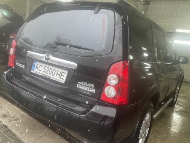 Черный Мазда Трибьют, объемом двигателя 2.3 л и пробегом 187 тыс. км за 4500 $, фото 3 на Automoto.ua