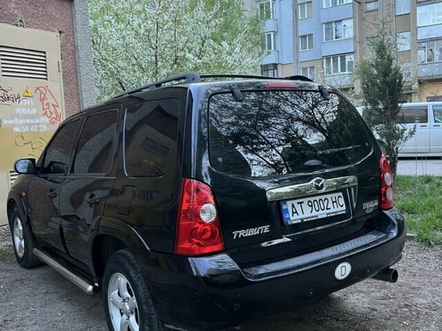 Черный Мазда Трибьют, объемом двигателя 2.3 л и пробегом 150 тыс. км за 5000 $, фото 2 на Automoto.ua