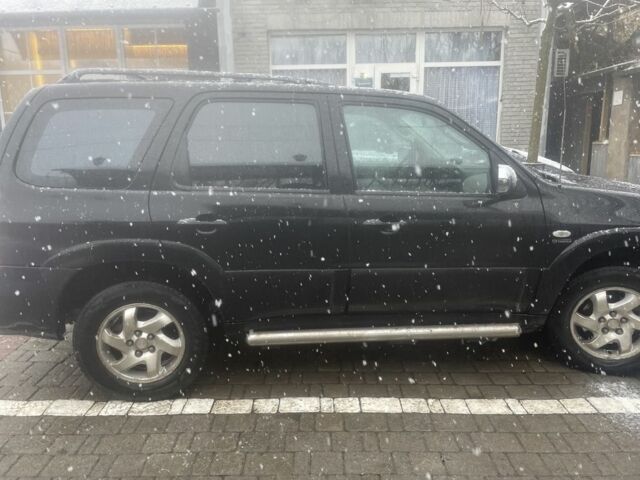 Черный Мазда Трибьют, объемом двигателя 2.3 л и пробегом 187 тыс. км за 4500 $, фото 6 на Automoto.ua