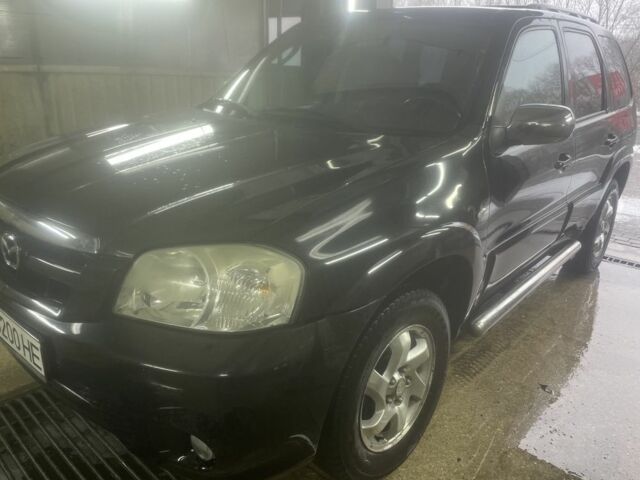 Черный Мазда Трибьют, объемом двигателя 2.3 л и пробегом 187 тыс. км за 4500 $, фото 5 на Automoto.ua