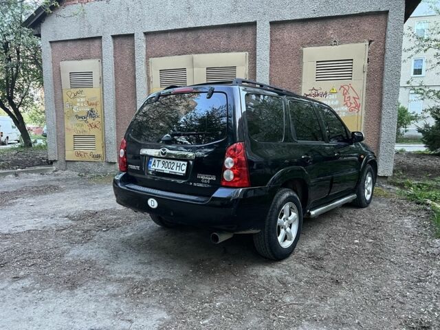 Черный Мазда Трибьют, объемом двигателя 2.3 л и пробегом 150 тыс. км за 5000 $, фото 4 на Automoto.ua