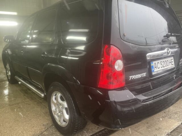 Черный Мазда Трибьют, объемом двигателя 2.3 л и пробегом 187 тыс. км за 4500 $, фото 2 на Automoto.ua