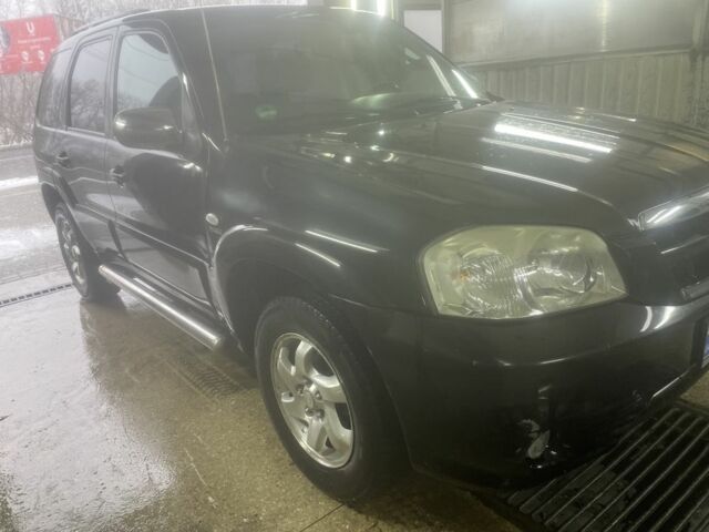 Черный Мазда Трибьют, объемом двигателя 2.3 л и пробегом 187 тыс. км за 4500 $, фото 4 на Automoto.ua