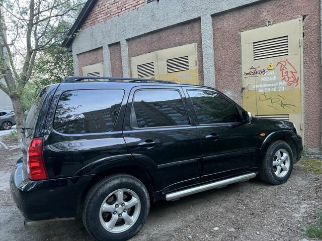 Черный Мазда Трибьют, объемом двигателя 2.3 л и пробегом 150 тыс. км за 5000 $, фото 3 на Automoto.ua