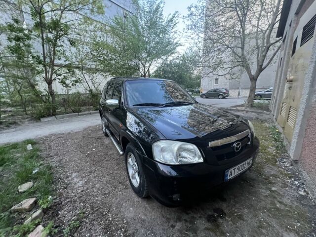 Черный Мазда Трибьют, объемом двигателя 2.3 л и пробегом 150 тыс. км за 5000 $, фото 1 на Automoto.ua