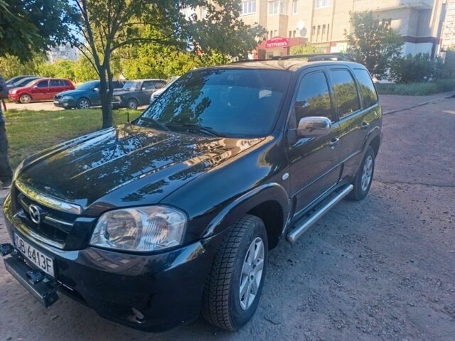 Чорний Мазда Трибьют, об'ємом двигуна 2.3 л та пробігом 223 тис. км за 4500 $, фото 1 на Automoto.ua
