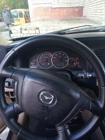 Мазда Трибьют 2005 в Шостке на Automoto.ua Черный Мазда Трибьют, объемом двигателя 2.97 л и пробегом 141 тыс. км за 5500 $, фото 12 на Automoto.ua