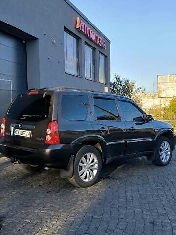 Коричневий Мазда Трибьют, об'ємом двигуна 2.97 л та пробігом 49 тис. км за 9500 $, фото 35 на Automoto.ua