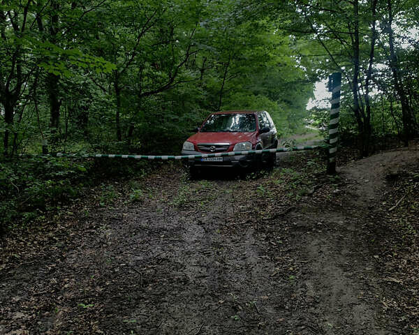 Красный Мазда Трибьют, объемом двигателя 1.99 л и пробегом 460 тыс. км за 4550 $, фото 4 на Automoto.ua