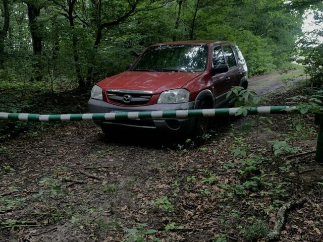 Червоний Мазда Трибьют, об'ємом двигуна 2 л та пробігом 460 тис. км за 4550 $, фото 3 на Automoto.ua