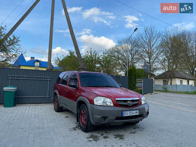 Красный Мазда Трибьют, объемом двигателя 1.99 л и пробегом 460 тыс. км за 4550 $, фото 6 на Automoto.ua
