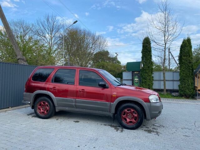 Червоний Мазда Трибьют, об'ємом двигуна 2 л та пробігом 460 тис. км за 4550 $, фото 5 на Automoto.ua