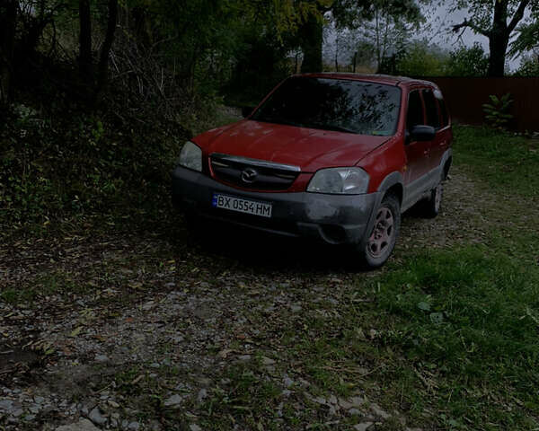 Красный Мазда Трибьют, объемом двигателя 1.99 л и пробегом 460 тыс. км за 4550 $, фото 1 на Automoto.ua