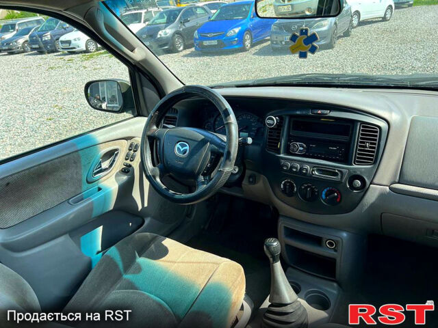 Мазда Трибьют, объемом двигателя 2 л и пробегом 250 тыс. км за 2800 $, фото 5 на Automoto.ua