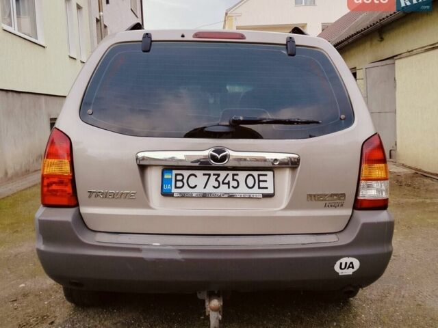 Сірий Мазда Трибьют, об'ємом двигуна 2 л та пробігом 305 тис. км за 4500 $, фото 6 на Automoto.ua