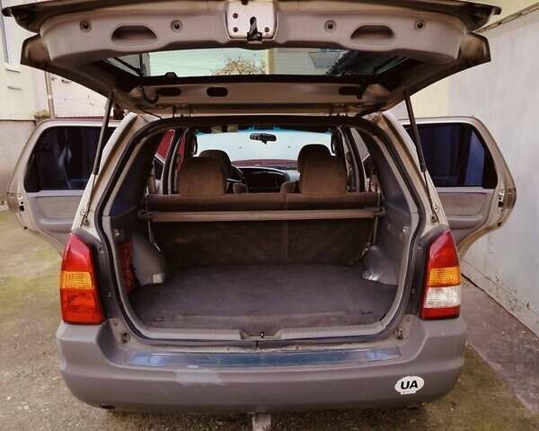 Сірий Мазда Трибьют, об'ємом двигуна 2 л та пробігом 301 тис. км за 5200 $, фото 13 на Automoto.ua