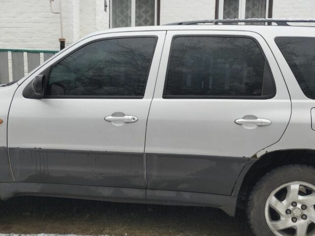 Сірий Мазда Трибьют, об'ємом двигуна 2 л та пробігом 364 тис. км за 2500 $, фото 2 на Automoto.ua