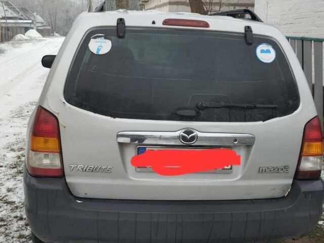 Сірий Мазда Трибьют, об'ємом двигуна 2 л та пробігом 364 тис. км за 2500 $, фото 1 на Automoto.ua