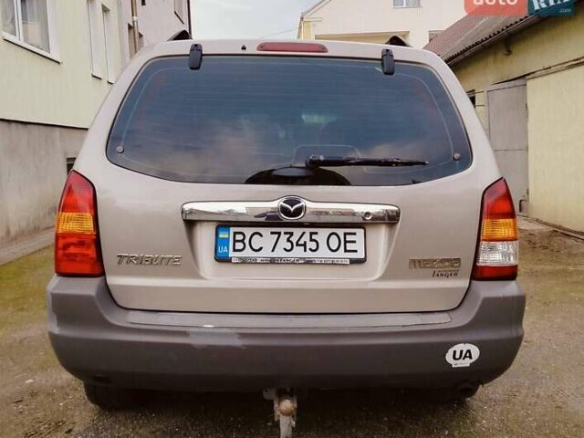 Сірий Мазда Трибьют, об'ємом двигуна 2 л та пробігом 301 тис. км за 5200 $, фото 6 на Automoto.ua