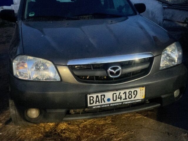 Сірий Мазда Трибьют, об'ємом двигуна 2 л та пробігом 260 тис. км за 2500 $, фото 3 на Automoto.ua