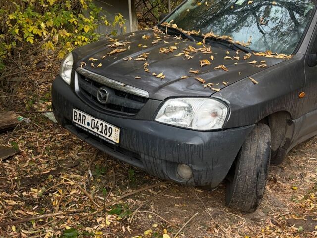 Сірий Мазда Трибьют, об'ємом двигуна 2 л та пробігом 260 тис. км за 2500 $, фото 1 на Automoto.ua