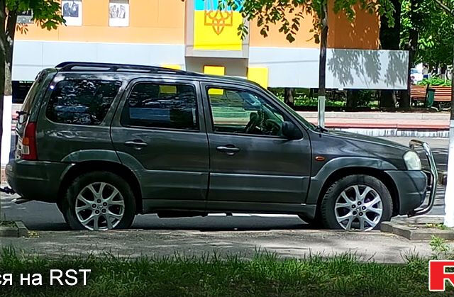 Серый Мазда Трибьют, объемом двигателя 3 л и пробегом 262 тыс. км за 3200 $, фото 11 на Automoto.ua
