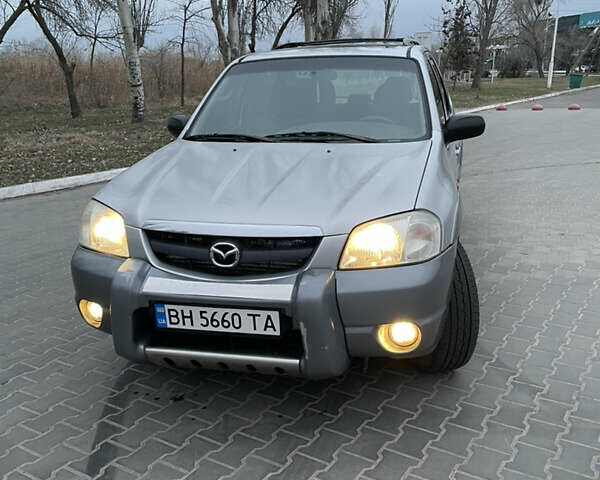 Серый Мазда Трибьют, объемом двигателя 3 л и пробегом 290 тыс. км за 6300 $, фото 12 на Automoto.ua