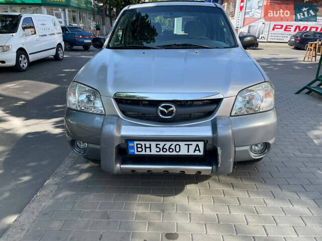 Серый Мазда Трибьют, объемом двигателя 3 л и пробегом 290 тыс. км за 6300 $, фото 8 на Automoto.ua