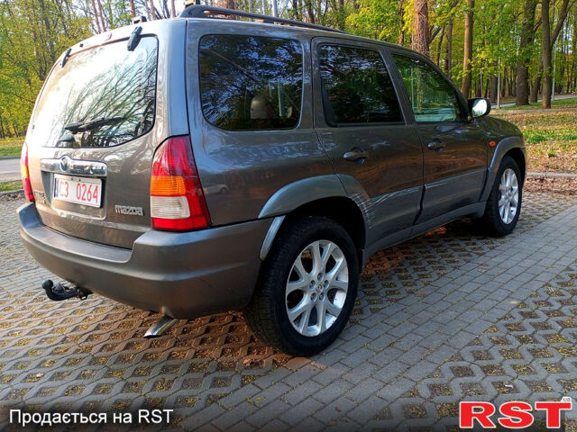 Серый Мазда Трибьют, объемом двигателя 3 л и пробегом 262 тыс. км за 3200 $, фото 3 на Automoto.ua