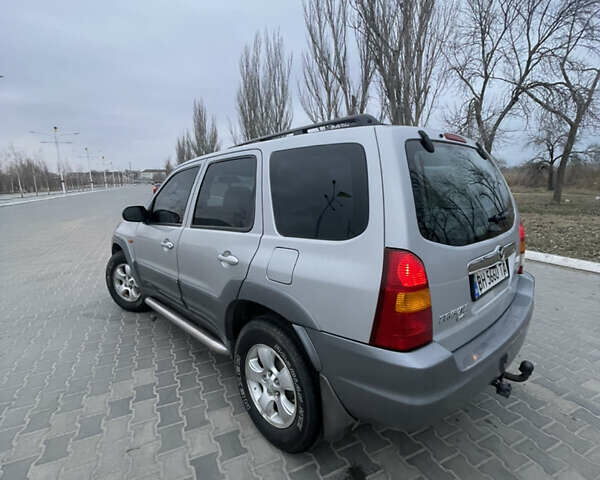 Серый Мазда Трибьют, объемом двигателя 3 л и пробегом 290 тыс. км за 6300 $, фото 18 на Automoto.ua