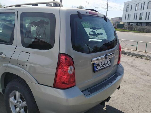 Серый Мазда Трибьют, объемом двигателя 3 л и пробегом 158 тыс. км за 5700 $, фото 2 на Automoto.ua