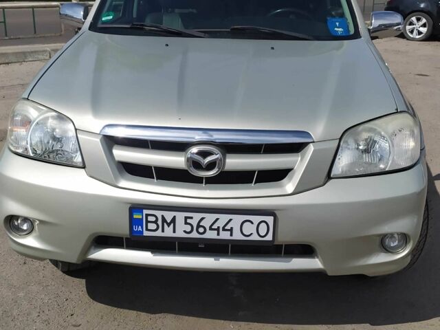 Серый Мазда Трибьют, объемом двигателя 3 л и пробегом 158 тыс. км за 5700 $, фото 3 на Automoto.ua