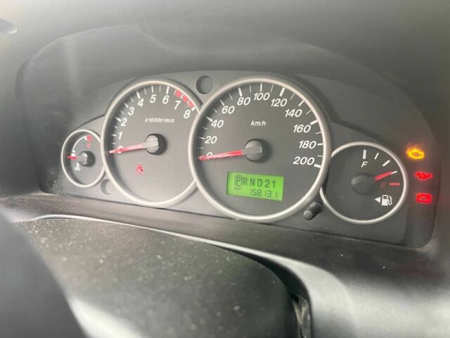 Серый Мазда Трибьют, объемом двигателя 3 л и пробегом 158 тыс. км за 5700 $, фото 9 на Automoto.ua