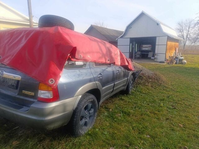 Синий Мазда Трибьют, объемом двигателя 0 л и пробегом 200 тыс. км за 2100 $, фото 1 на Automoto.ua