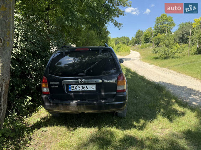 Синій Мазда Трибьют, об'ємом двигуна 3 л та пробігом 164 тис. км за 5100 $, фото 1 на Automoto.ua