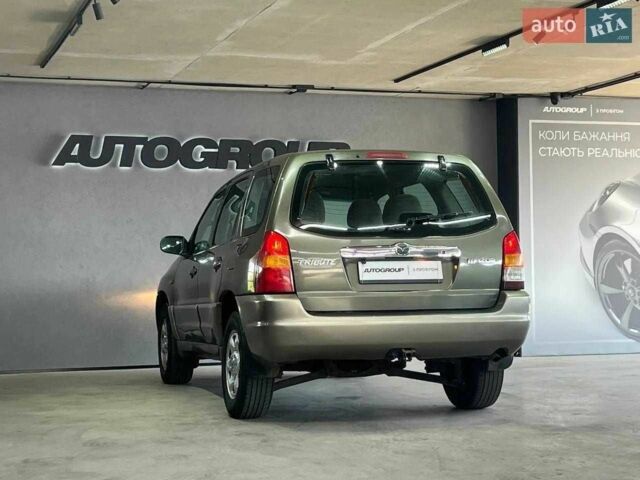 Зелений Мазда Трибьют, об'ємом двигуна 2 л та пробігом 358 тис. км за 3800 $, фото 1 на Automoto.ua